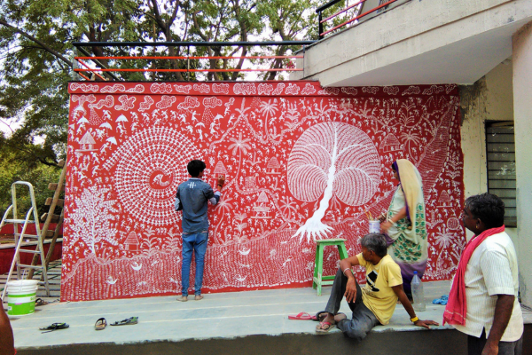 Indian artisan creating traditional warli painting by hand (Google)